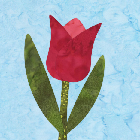 A red tulip with green leaves stands against a light blue abstract background.