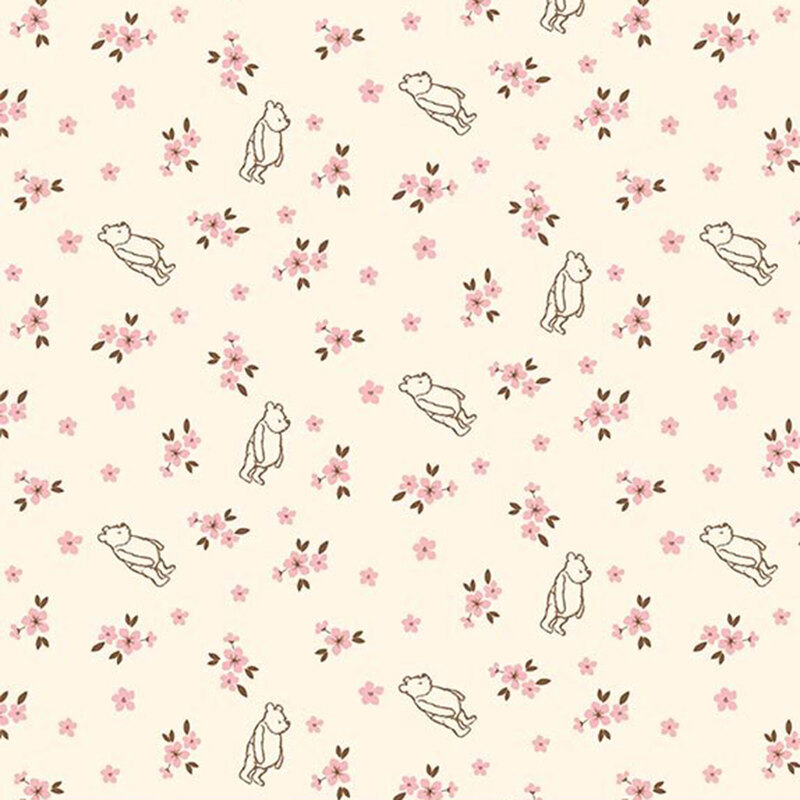 Cream fabric with a pattern of Winnie the Pooh scattered among small yellow florals.