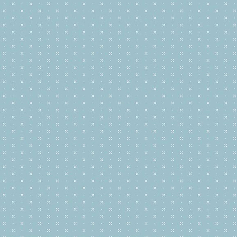 Blue fabric with a timeless pattern of X’s and dots, creating a simple yet versatile design.