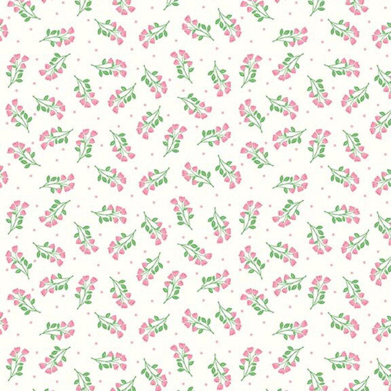 Cream fabric with a tossed pattern of delicate green and pink florals and pin dots