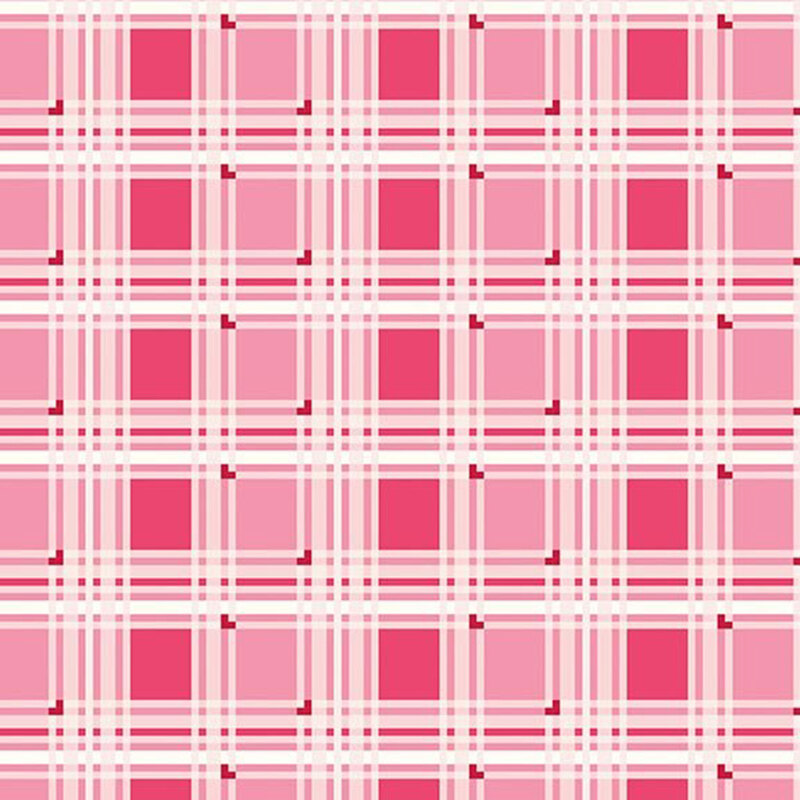 Medium and hot pink fabric featuring a light peach plaid lattice pattern with red accents