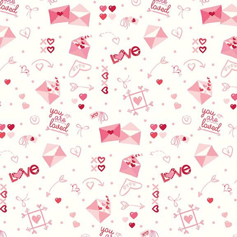 Cream fabric with an all-over pattern of pink love letters, light pink doodles, and loving phrases