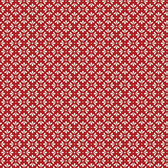 Dark red fabric featuring a repeating pattern of white floral motifs and dots.