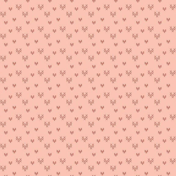 Blush fabric featuring a repeating pattern of red cross-hatched hearts.