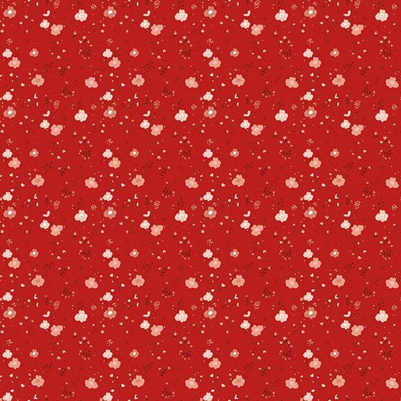 Ruby red fabric with a scattered pattern of florals and sprigs with a dotted background.