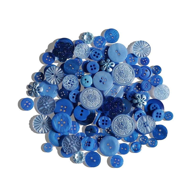 A scattered collection of various blue buttons in different sizes and styles.