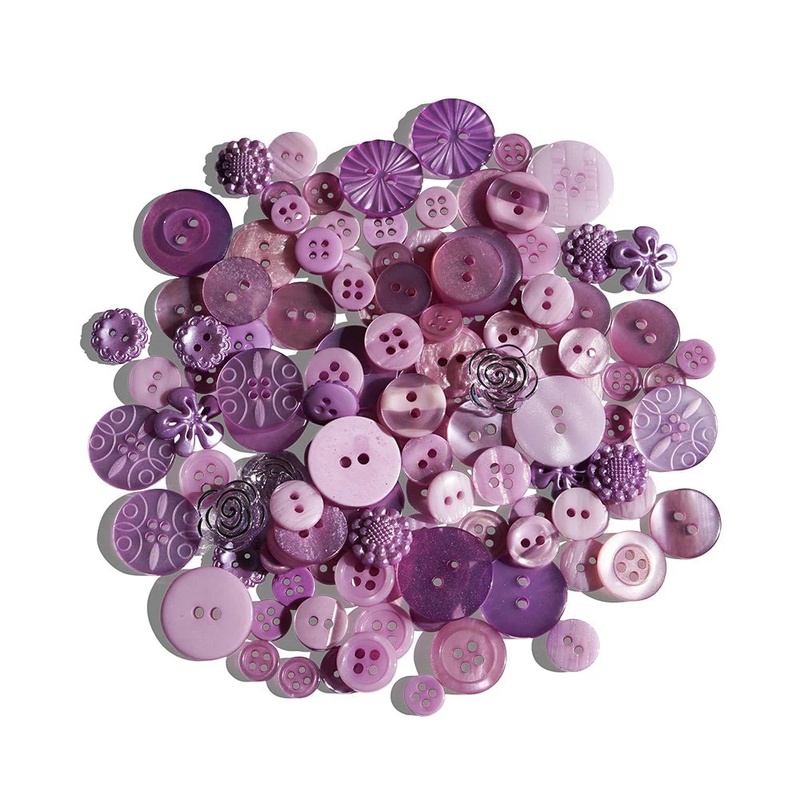 A scattered collection of various purple buttons in different sizes and styles.