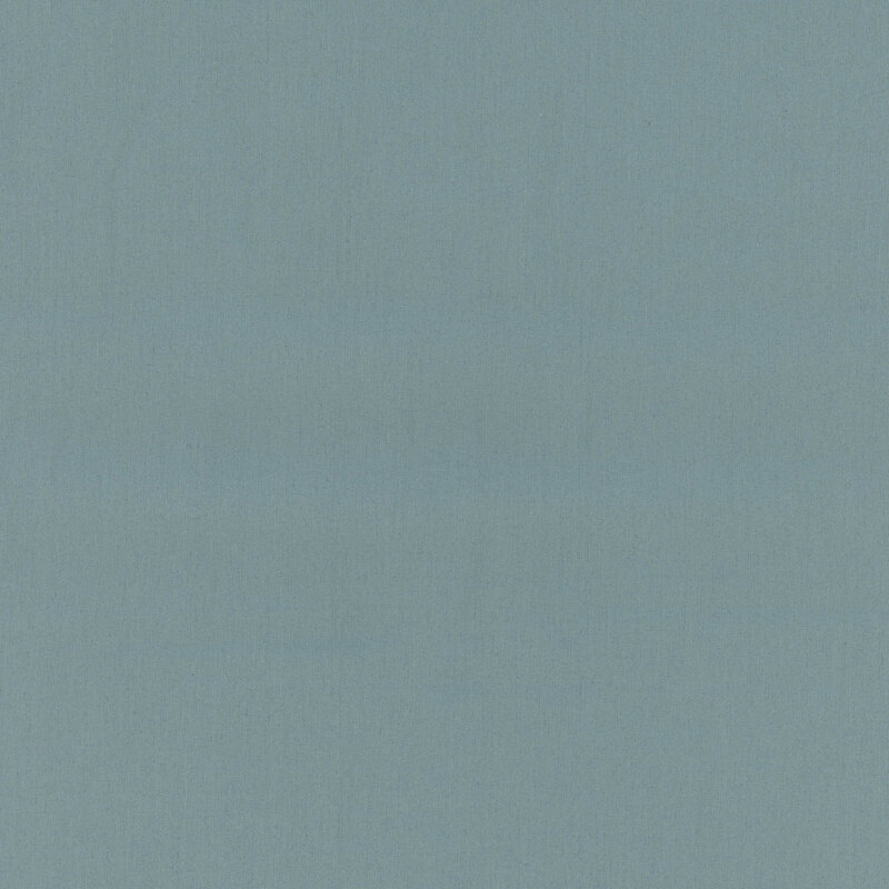 8" x 8" swatch of a basic faded blue fabric.