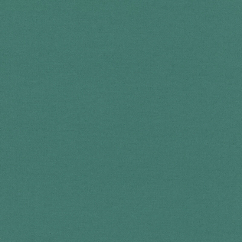 An 8" x 8" swatch of phthalo green solid fabric