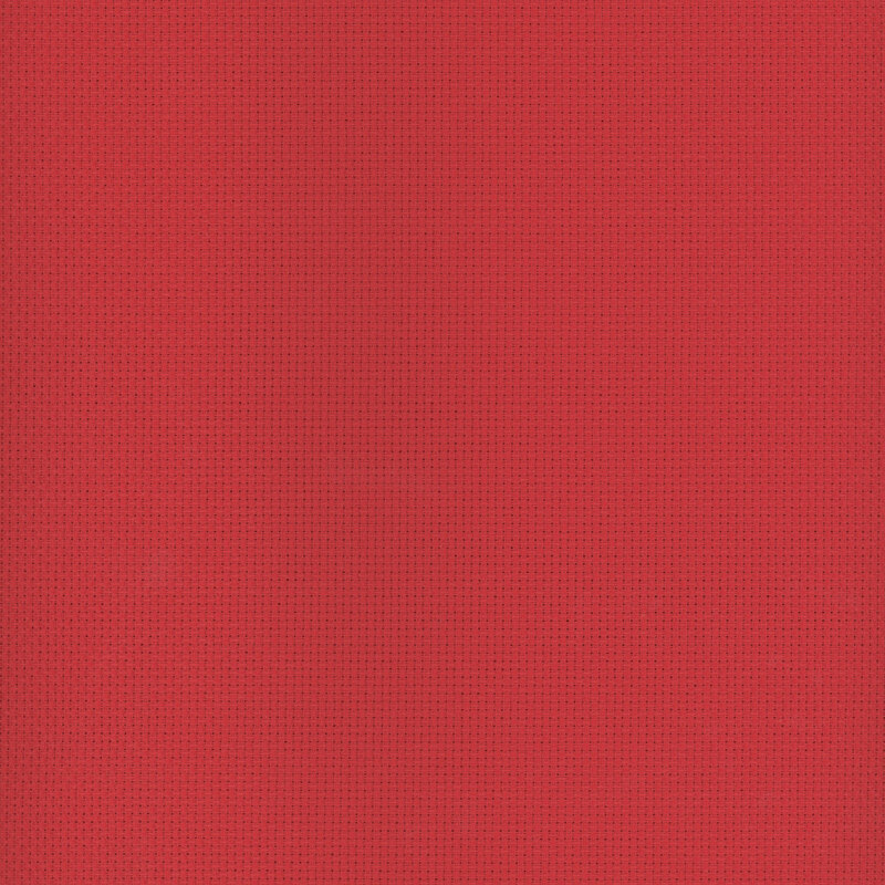 A swatch of red 14 count aida cloth from wichelt. 