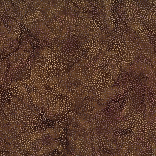 A mottled coffee brown batik fabric with scattered light brown dots.