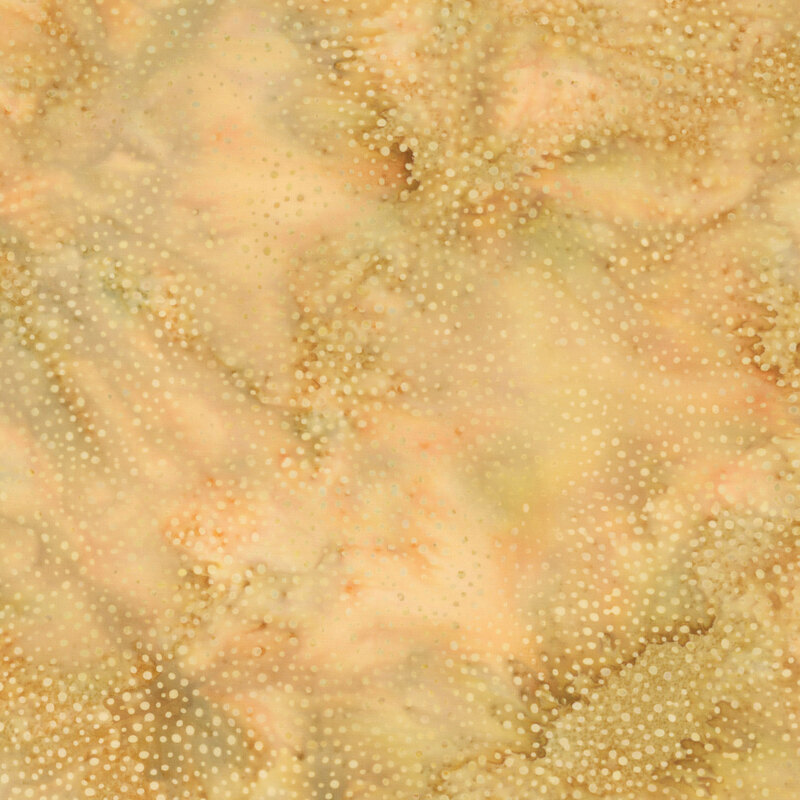 A mottled ginger brown batik fabric with scattered light brown dots.