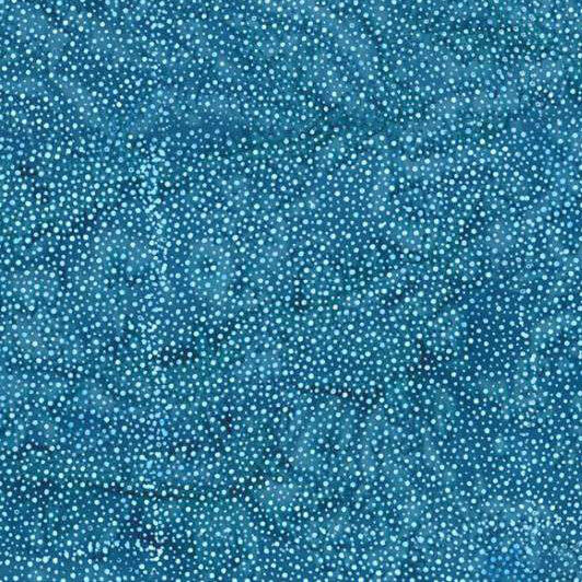 A mottled sky blue batik fabric with scattered light blue dots.