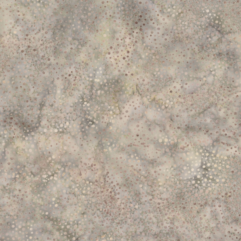 A mottled mouse gray batik fabric with scattered light gray dots.