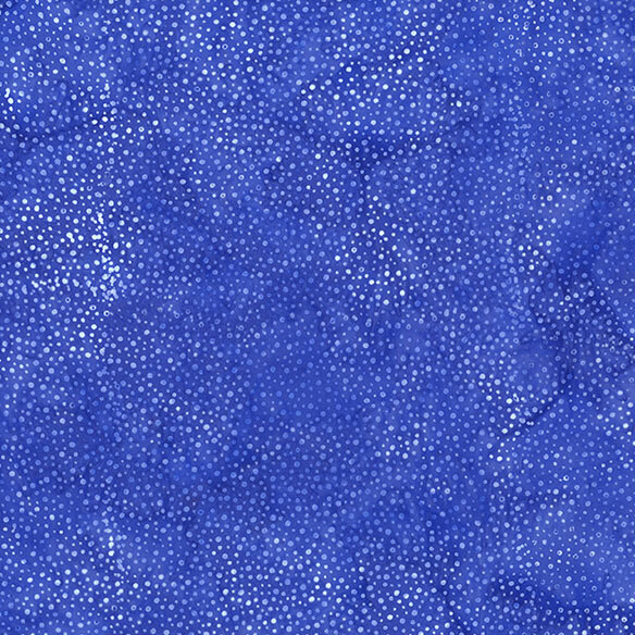 A mottled lapis blue batik fabric with scattered white dots.