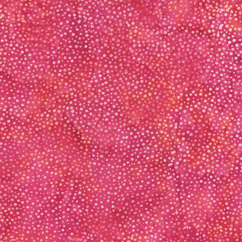 A mottled candy pink batik fabric with scattered light pink dots.