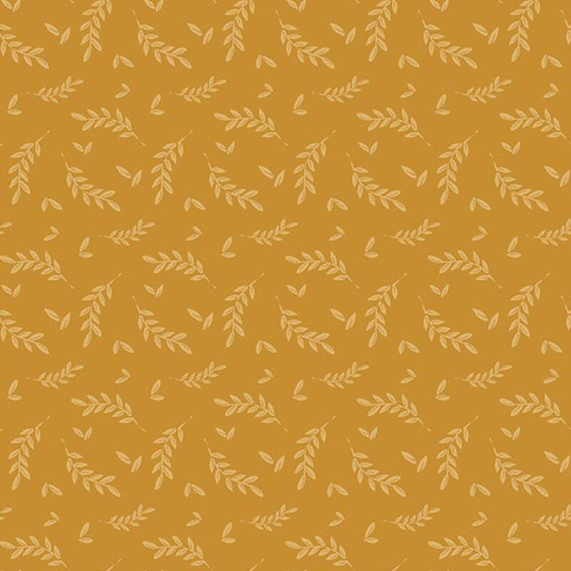 Mustard yellow fabric with a tossed, tonal pattern of leaves