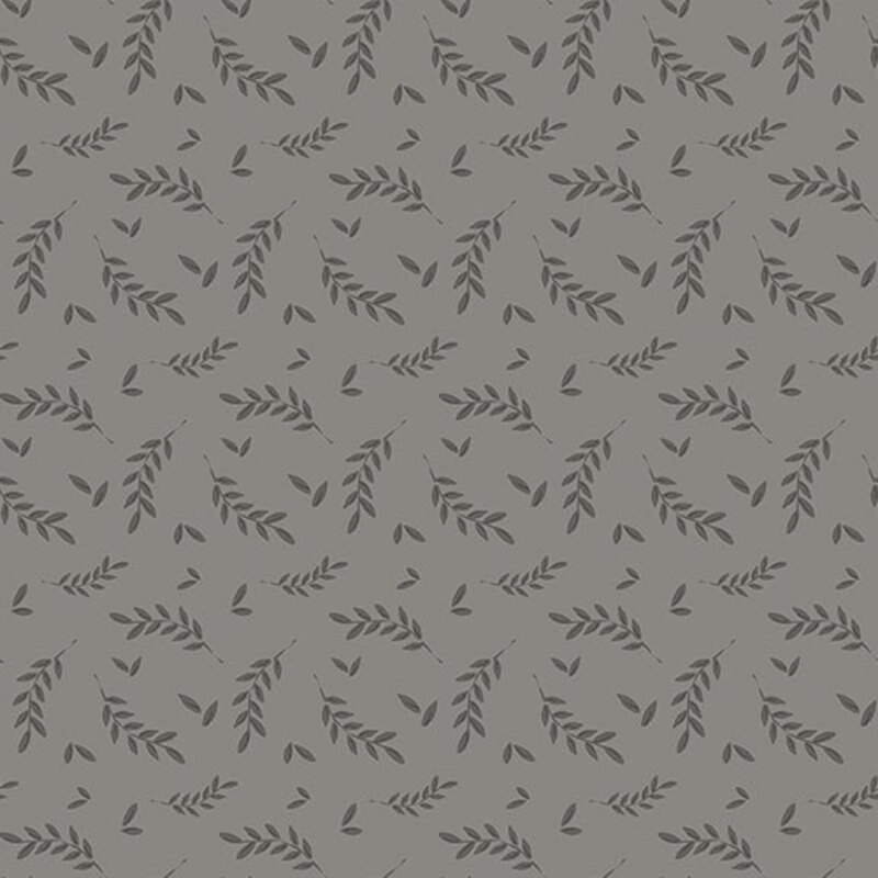 Gray fabric with a tossed pattern of dark gray leaves