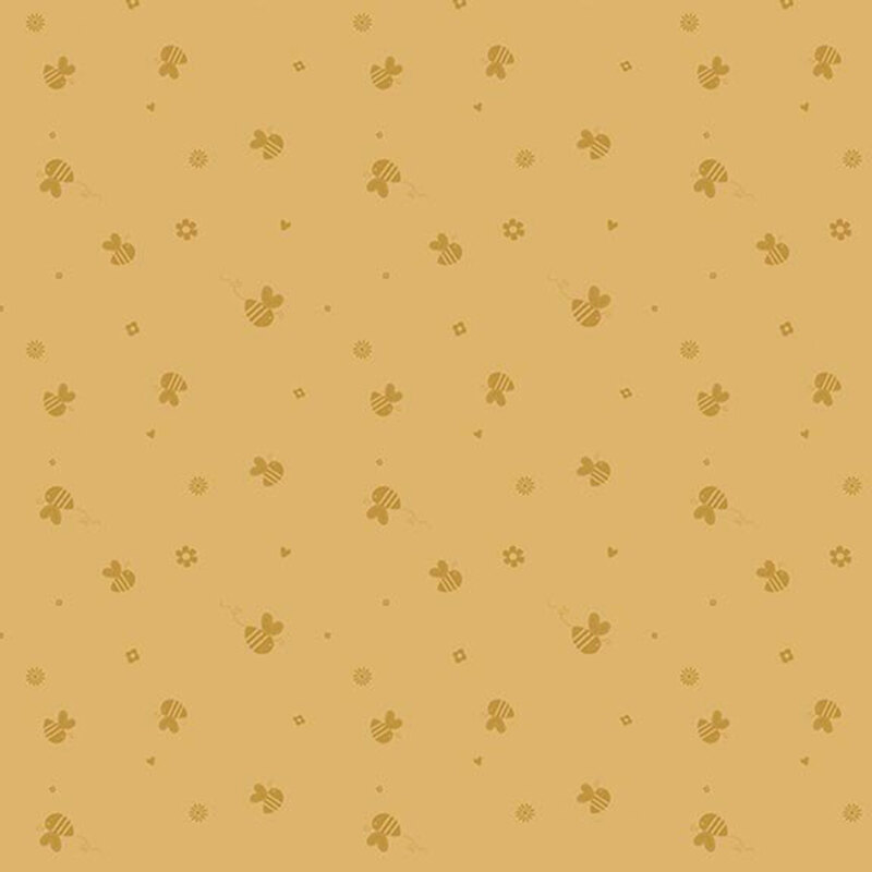 Goldenrod yellow fabric with a tossed pattern of dark gold honeybees, flowers, and other small shapes.
