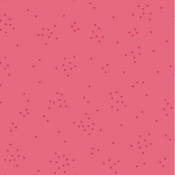 This fuchsia fabrics is scattered with tiny tonal crosses clustered together.