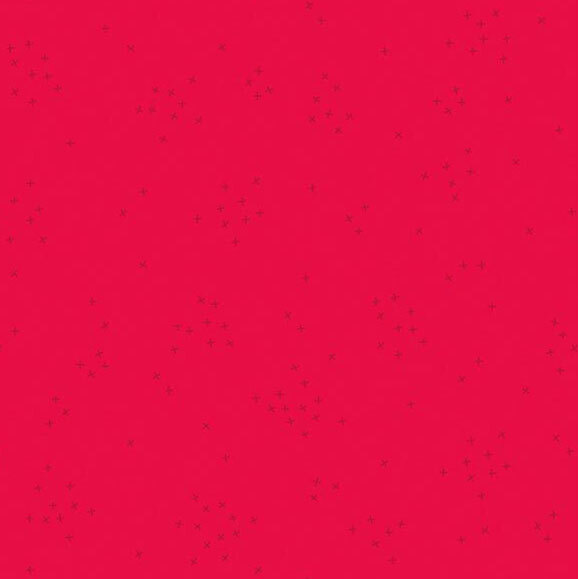 This hot pink fabric is scattered with tiny tonal crosses clustered together.