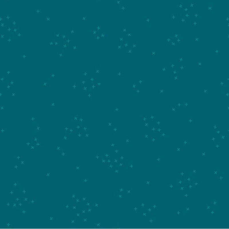 This dark teal fabric is scattered with tiny tonal crosses clustered together.
