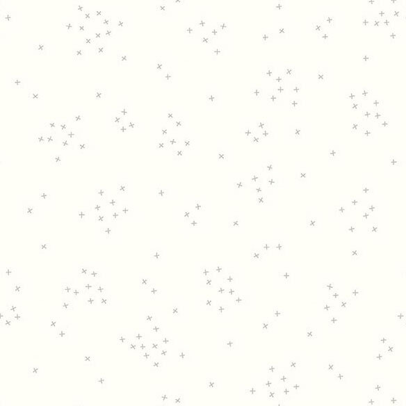 This white fabric is scattered with tiny grey clustered together.