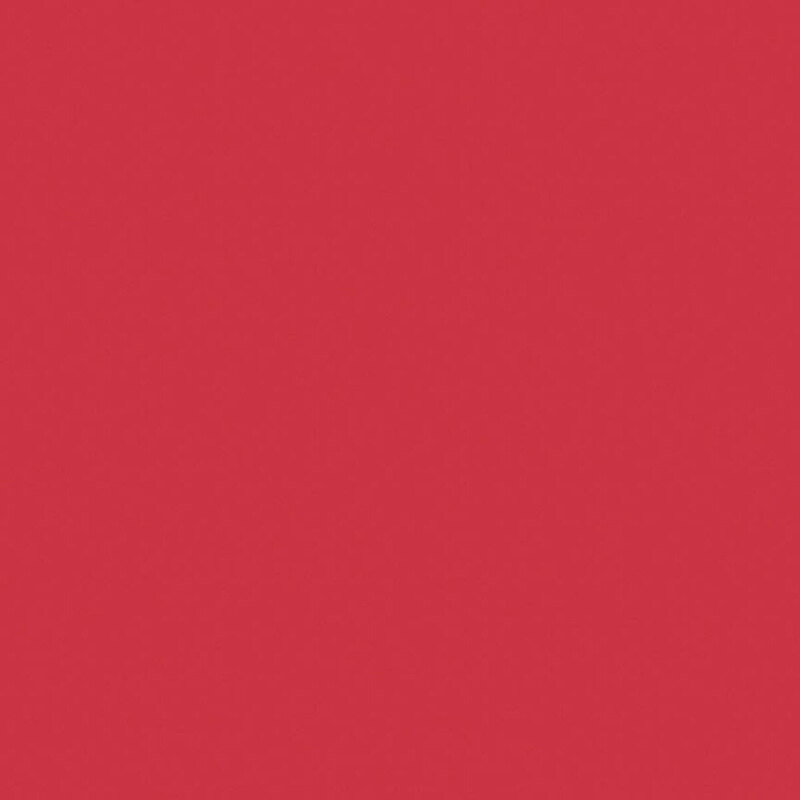  This solid flannel fabric features a strawberry red hue.