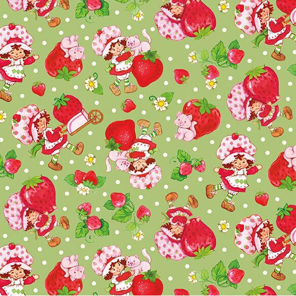 A leaf green fabric with tossed motifs of Strawberry Shortcake, Custard the cat, and giant strawberries. 