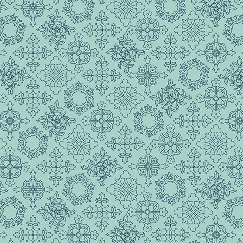 Turquoise fabric with a a pattern of dark teal line-art crosses and medallions