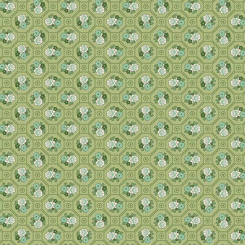 Lettuce green fabric with a geometric lattice pattern of dots and squares containing white and teal florals