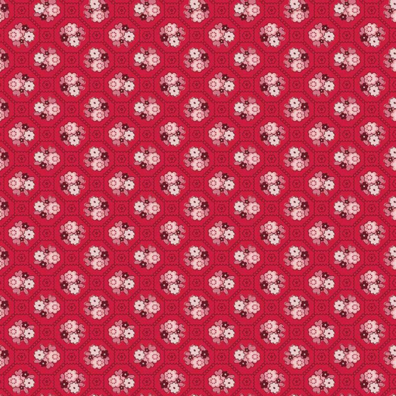 Cherry red fabric with a geometric lattice pattern of dots and squares containing white and pink florals
