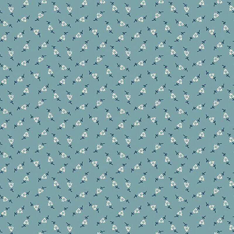 Cottage blue fabric with a ditsy pattern of white florals with navy blue stems