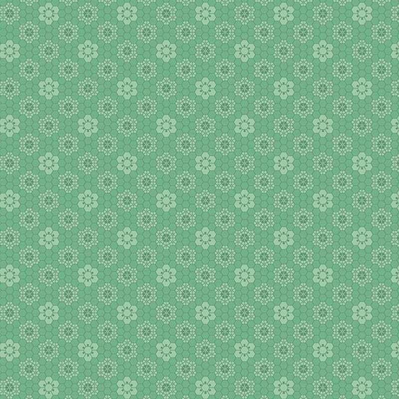Jade green fabric with a tonal honeycomb texture and geometric floral designs