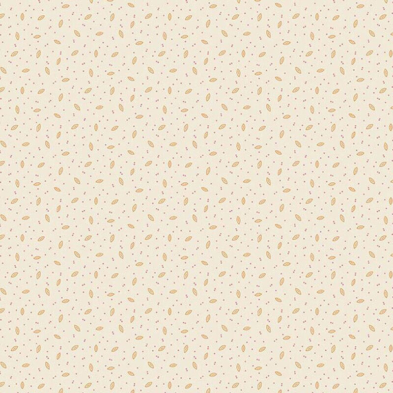 Primitive pattern of gold seed shapes and dots on a cream background