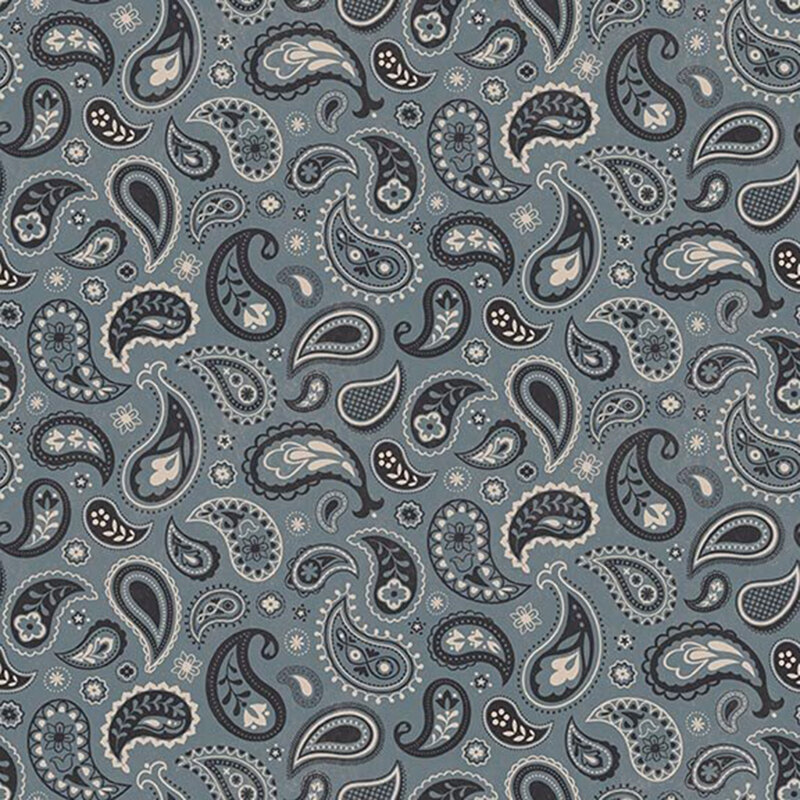 Denim blue fabric with a indigo and beige paisley design