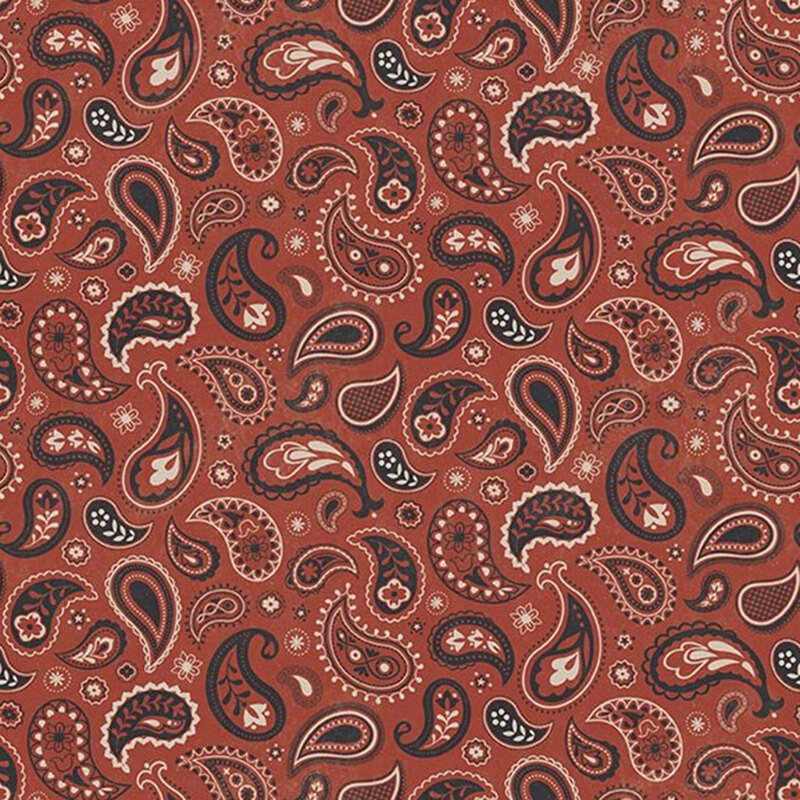 Brick red fabric with a dark gray and beige paisley design