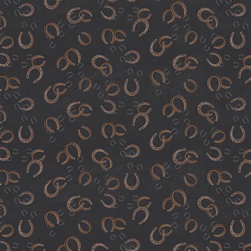 Tossed pattern of brown horseshoes on a charcoal background