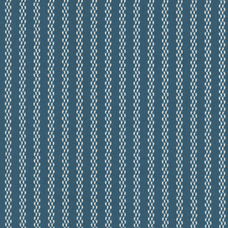 Dark blue fabric featuring a wavy, chain-like stripe pattern in white.