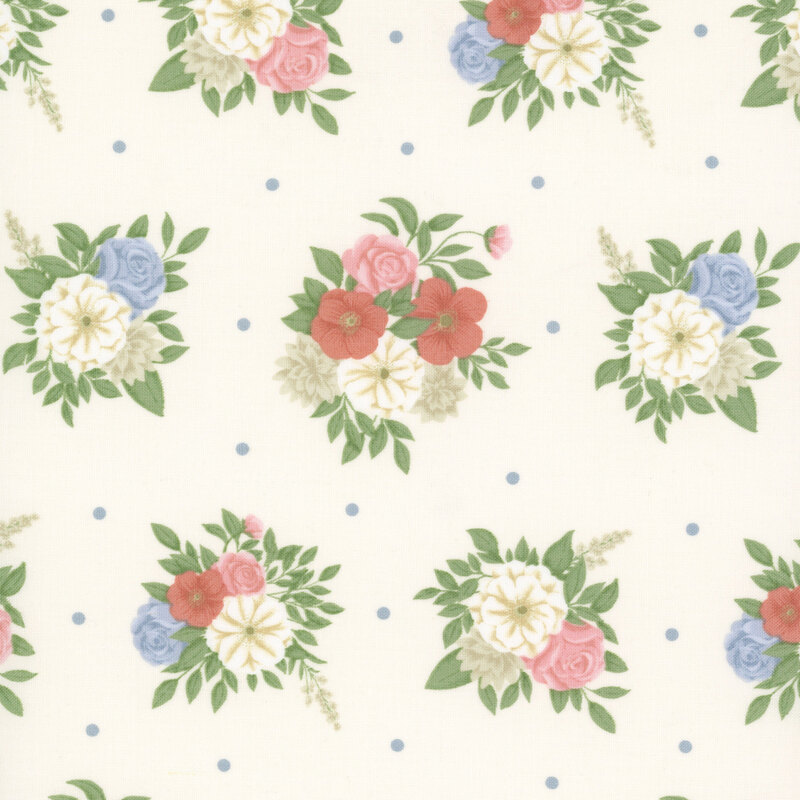 A soft beige fabric patterned with delicate pastel floral bouquets and scattered light blue dots.