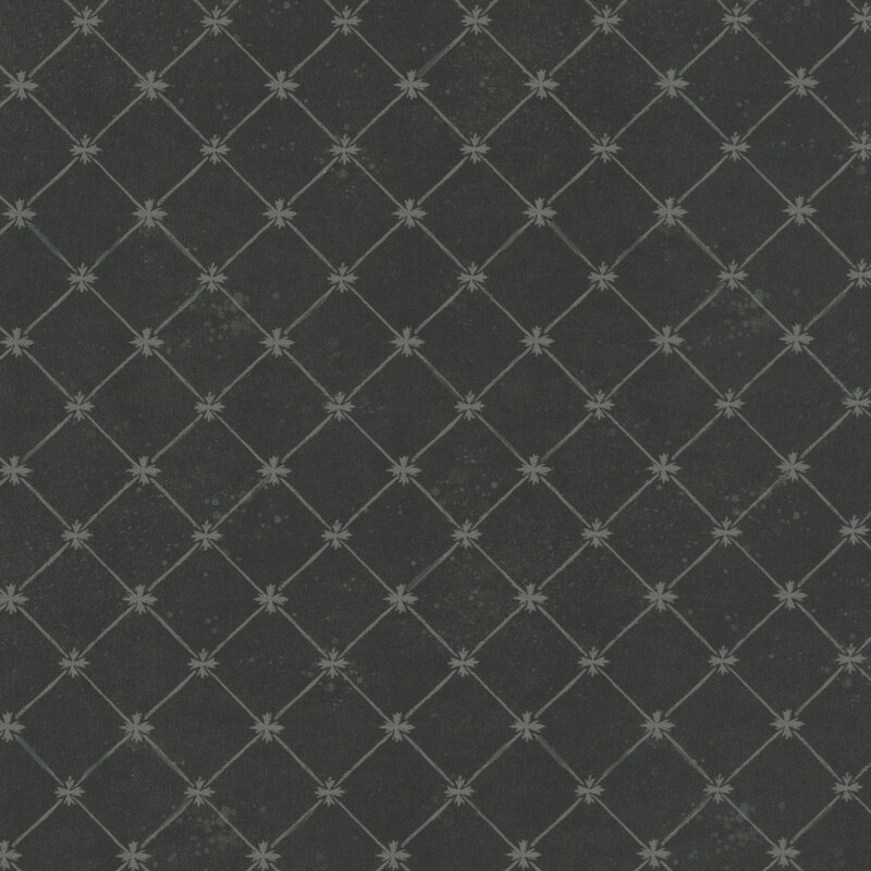 Black textured fabric with a grey floral lattice design