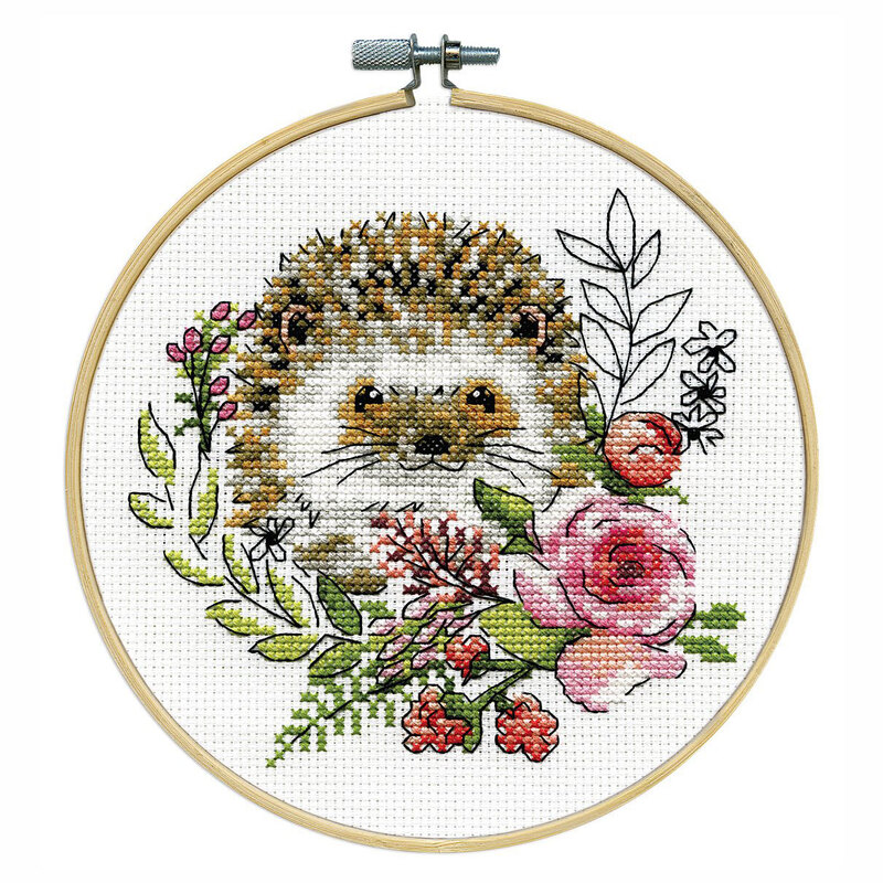 The completed Hedgehog counted cross stitch picture kit, isolated on a white background. 