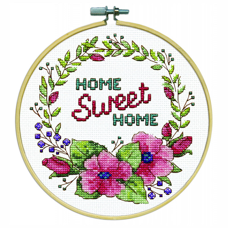 The completed Floral Wreath counted cross stitch picture kit, isolated on a white background. 