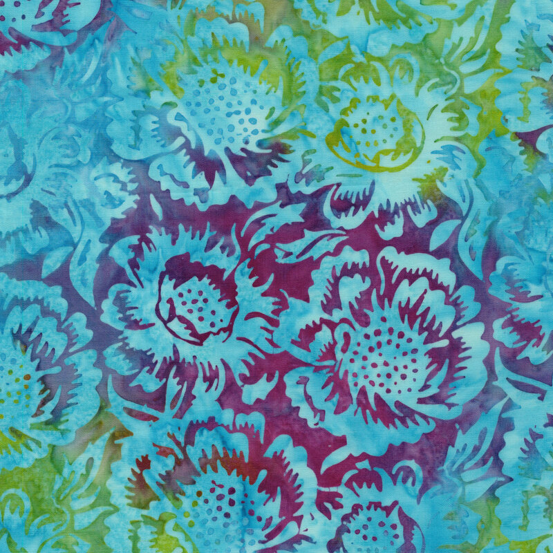 A mottled cerulean batik fabric with large lime green and plum flowers. 
