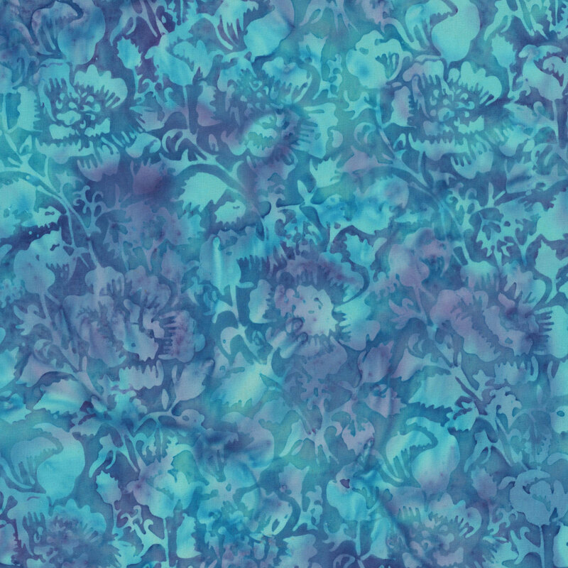 A mottled azure and purple batik fabric with flowers and vines. 