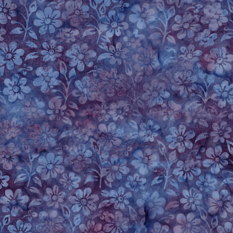 A mottled violet and plum batik fabric with flowers and sprigs. 