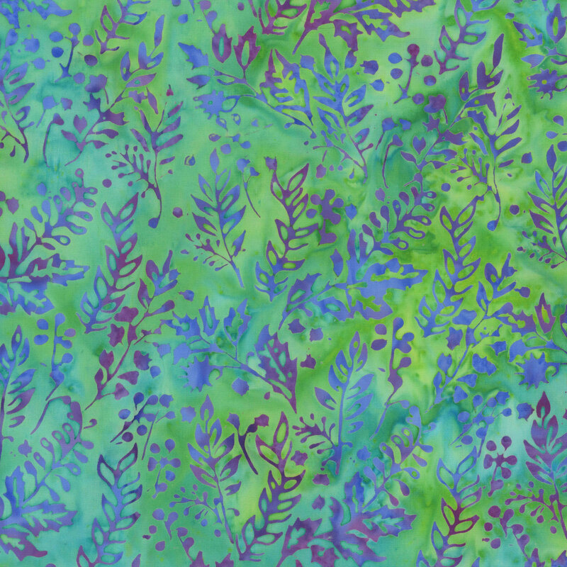 A mottled lime green and ocean blue batik fabric with violet leaves and berries. 