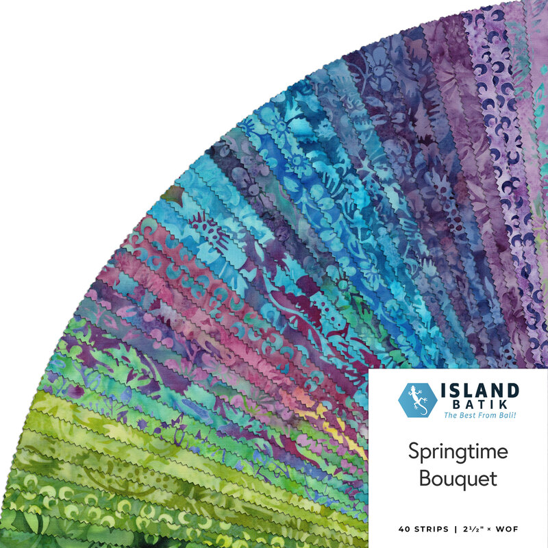 A fanned fabric collage featuring green, blue, and purple batik fabrics from the Springtime Bouquet Collection from Island Batiks. 