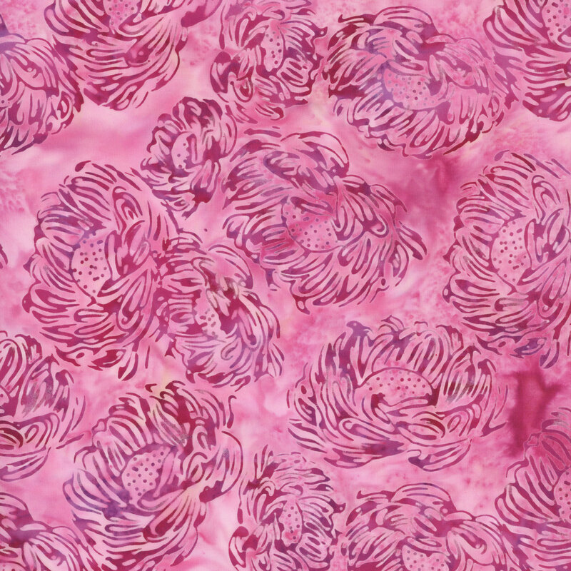 A ballerina pink batik fabric with dark pink flowers. 