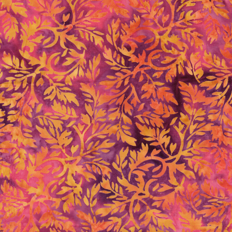 A violet and hot pink batik with light orange leaves. 